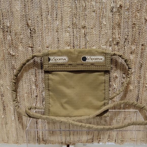 Lesportsac Handbags - Vintage Beige LeSportsac Travel Passport/Wallet Crossbody